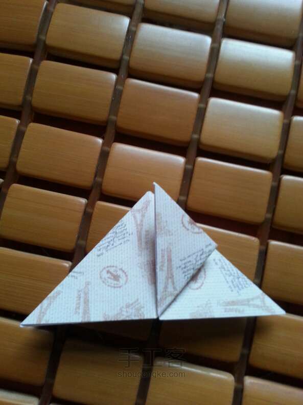 「妮子」可爱旅行爱心折纸方法 第9步