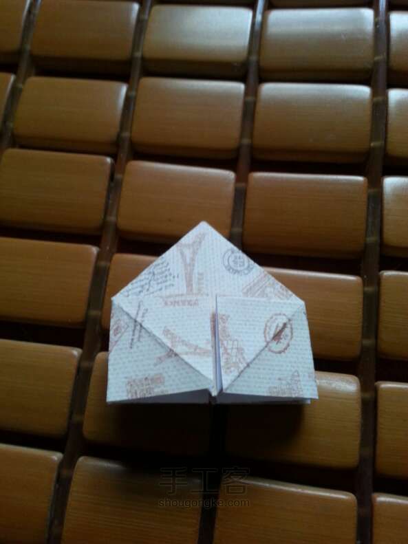 「妮子」可爱旅行爱心折纸方法 第12步