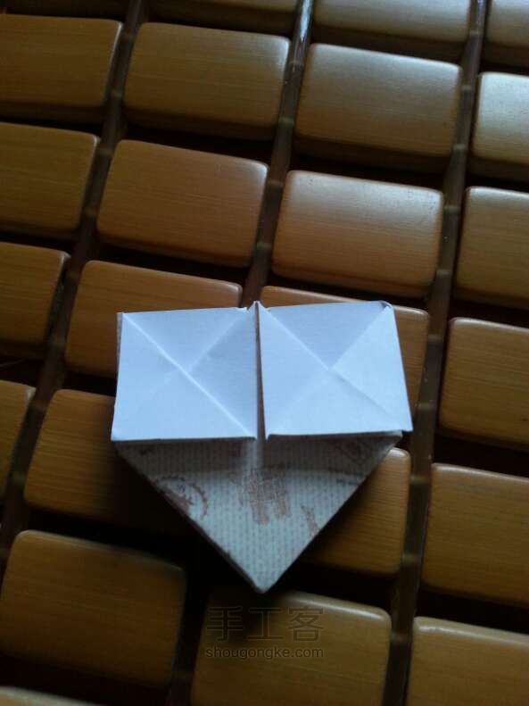 「妮子」可爱旅行爱心折纸方法 第14步