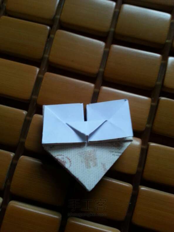 「妮子」可爱旅行爱心折纸方法 第15步