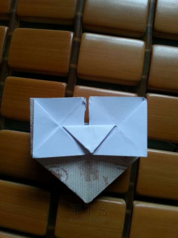「妮子」可爱旅行爱心折纸方法 第18步