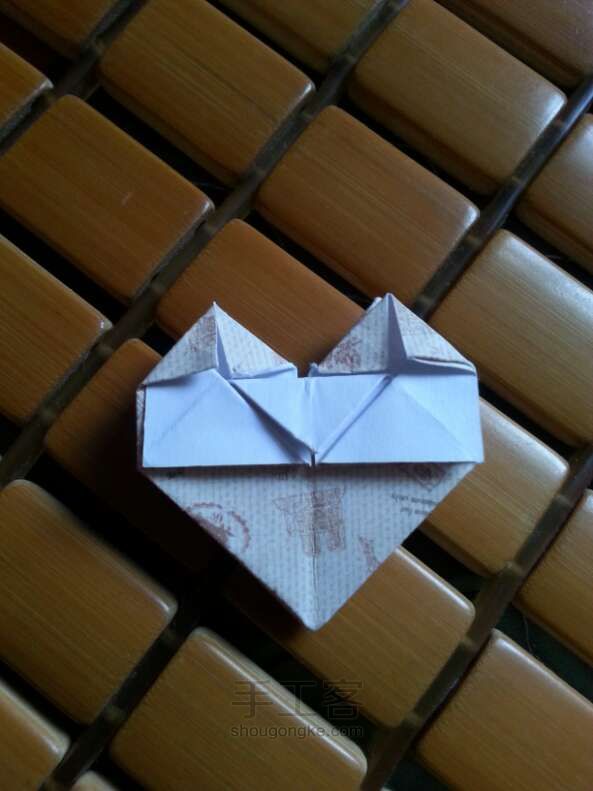 「妮子」可爱旅行爱心折纸方法 第20步