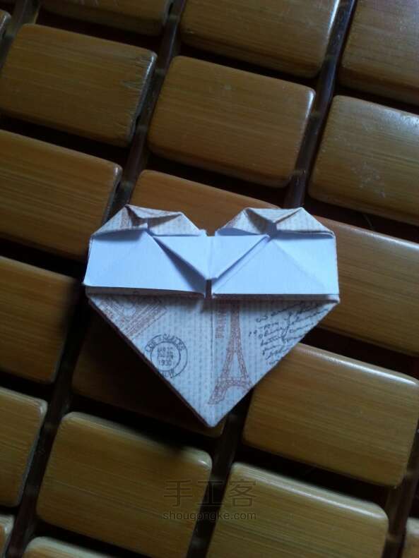 「妮子」可爱旅行爱心折纸方法 第21步