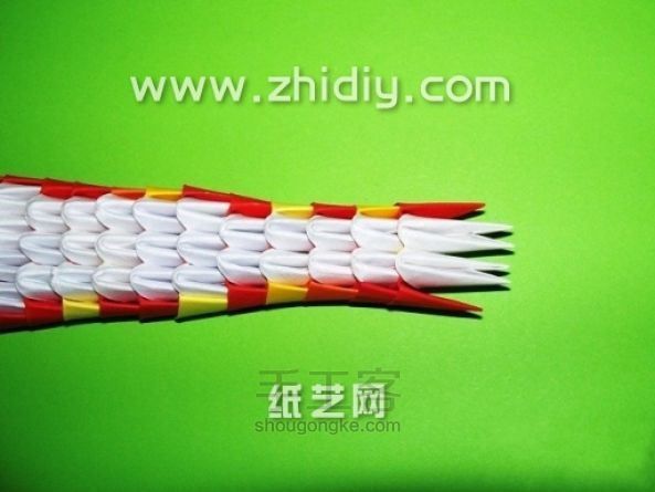 折纸三角插眼镜蛇手工制作教程 第18步