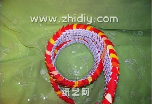 折纸三角插眼镜蛇手工制作教程 第47步
