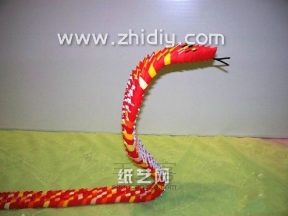 折纸三角插眼镜蛇手工制作教程 第46步