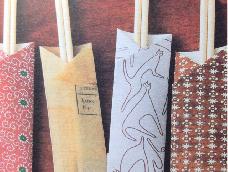 令人心动的筷子袋。可以尝试用各种不同的彩纸来制作。
