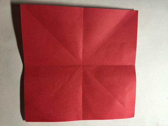 （纸盒系列五十一）一款简单立方纸盒的折法 第3步
