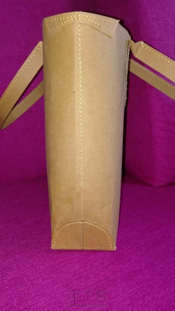 皮料价格太贵，没舍得动手，用水洗牛皮纸做了个。外形大概差不多吧。 第1张