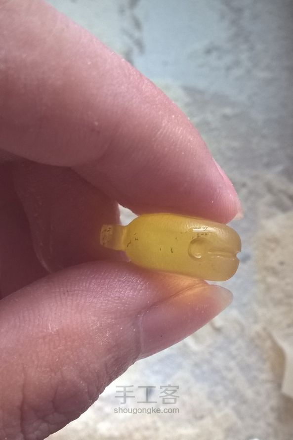金珀小铃铛一枚。 第13步