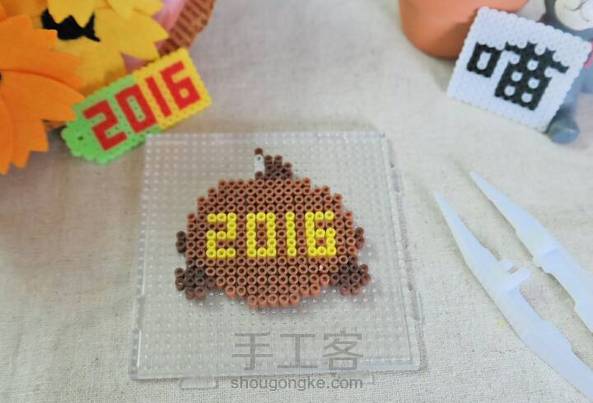 【宅猫猫·像素拼豆系列·吉祥物康康】2016猴年春晚吉祥物发布了，然后喵在朋友圈的各种刷屏下，也忍不住来了个像素康，喜欢的友友们可以动起手来哦！ 第2张