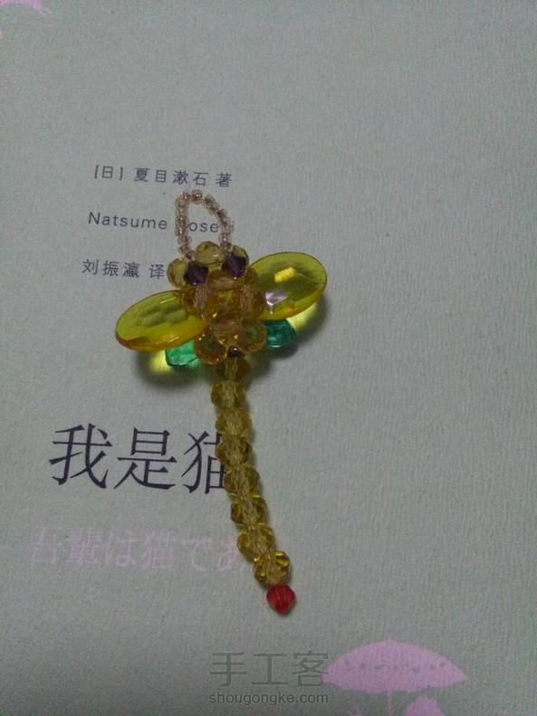 感谢教程！非常详细的珠子配件清单，非常简单的一个初学者课程。因为没有完全一样的珠子，翅膀上用亚克力珠子，线是0.2毫米的。下次改进。