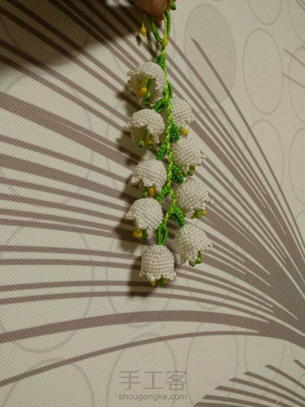 终于编好了一串铃兰。。虐手啊！ 第2张