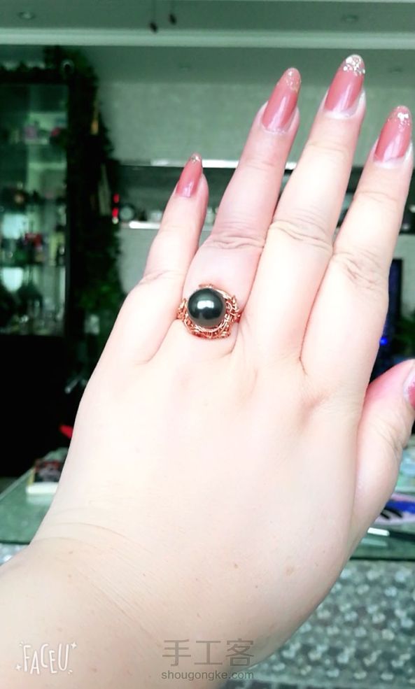 黑珍珠戒指。