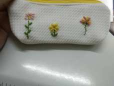 觉得绣花还不错不忍浪费随手做了个零钱包