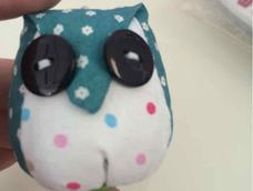 我做的哦。。蠢蠢的,扣子没那么好看