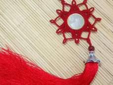 用72号线做花边的雀头结适当增加，花型才能更完美