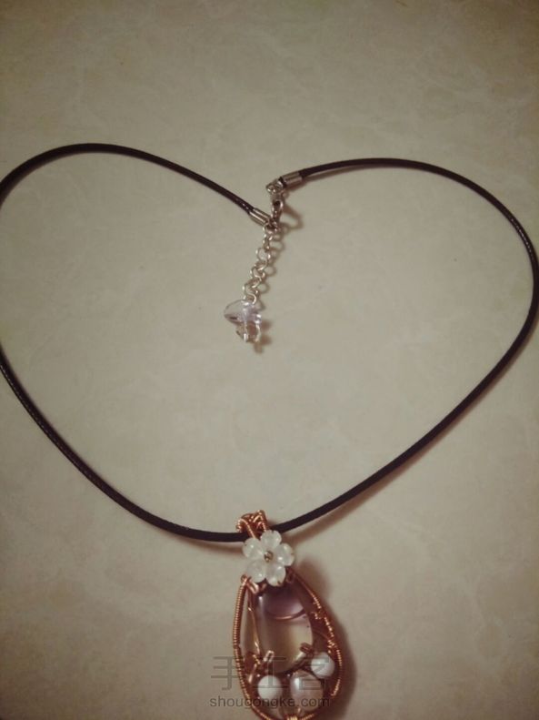 仿了一个，有点丑。紫黄晶透明的，背后的铜线有点乱