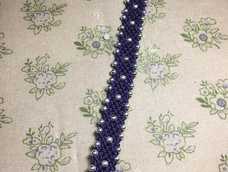 两个问题:一是平放时,手环会有扭转现象,我猜应该是手式松紧不一的缘故。二是编完才发现银珠的大小有不统一,这肯定是上次不小心银珠子混在一起的后遗症。