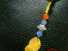 旗袍蜜蜡+如意烧蓝
寓意 旗开得胜