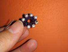 哈哈，烧结的时候没注意把珠子给烤糊了，下次用真珍珠做