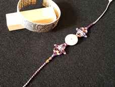 平安扣19咪,在老师教程上多加了根线,一边尝试了加根彩金线,感觉双色线好看