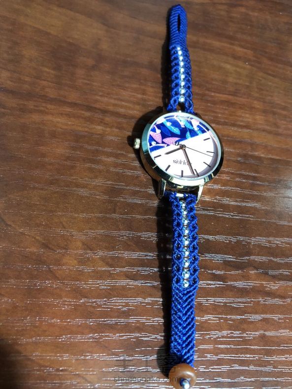 女儿的粉色皮表带剪掉，编了绳子的，感谢教程，挺美 第2张