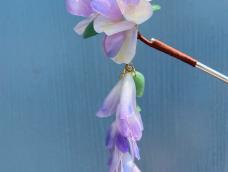 紫藤的小花瓣弄得多是很好看，还有摩擦产生的叮叮当当的声音。