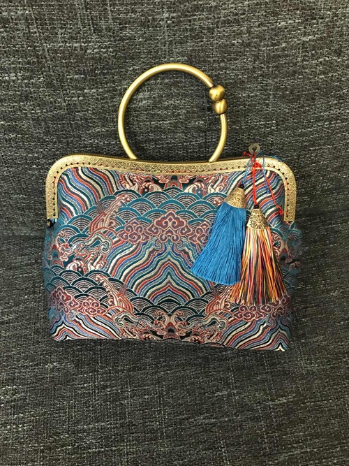 江水海崖花纹口金包 第17步