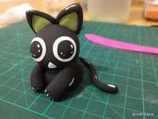 一只丑萌(不好看)的小黑猫~