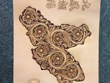 原创的一副我们朝阳市的地图，内容用传统的唐草纹饰雕刻！