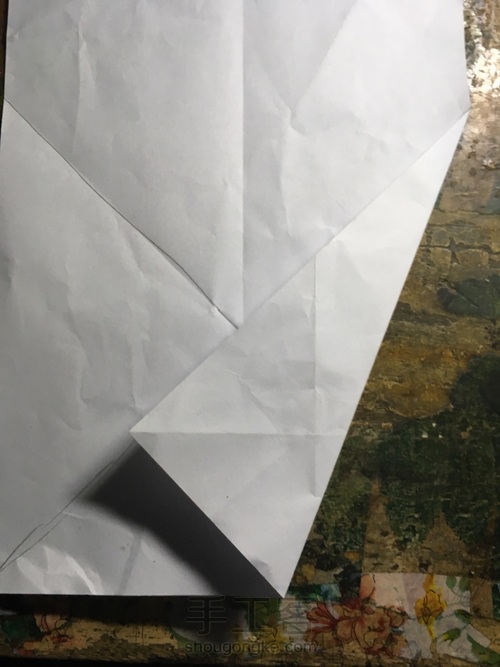 参加过大赛的飞60米的纸飞机 第6步