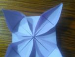 一款简易四瓣纸花的折法