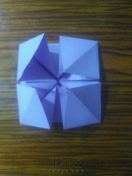 一款简易四瓣纸花的折法 第12步