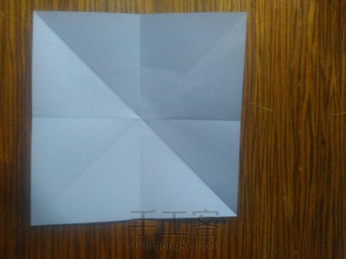 一款简易四瓣纸花的折法 第2步
