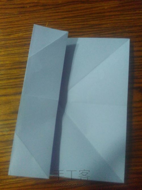 一款简易四瓣纸花的折法 第3步