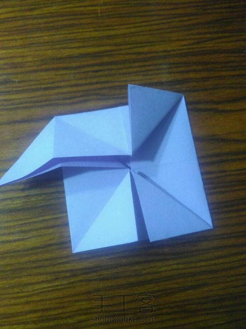 一款简易四瓣纸花的折法 第9步