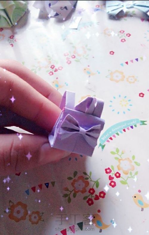 简单的折纸可爱小包包如何折叠 第30步