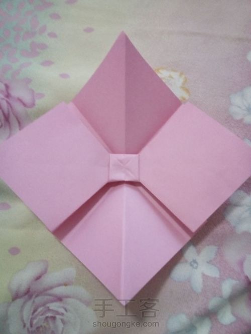 折纸蝴蝶结。 第10步