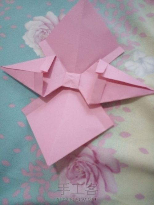 折纸蝴蝶结。 第12步