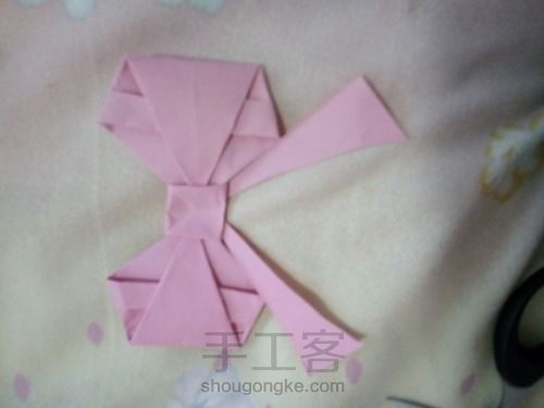折纸蝴蝶结。 第14步