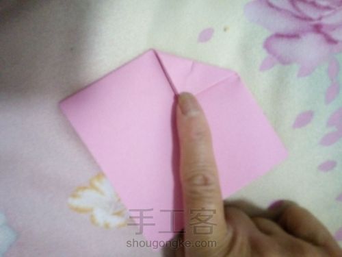 折纸蝴蝶结。 第4步