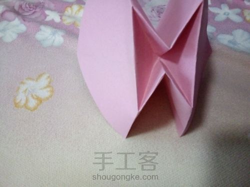 折纸蝴蝶结。 第6步