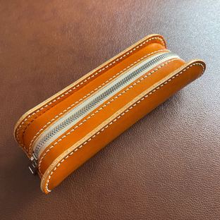 融本牛皮工具袋学生笔袋贝壳形铅笔袋教程