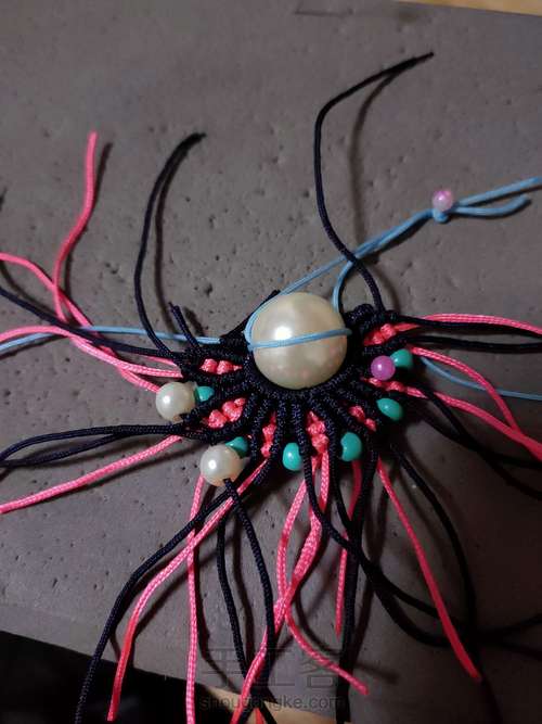 凤冠花嫁刀马旦编绳艺术 第12步