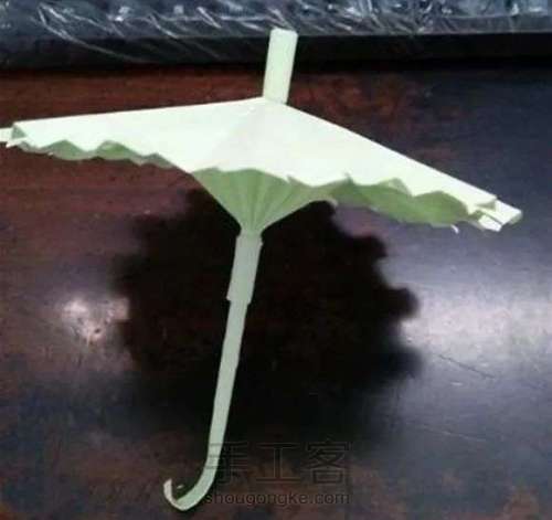立体小雨伞的折法图解 儿童纸雨伞制作方法 第25步